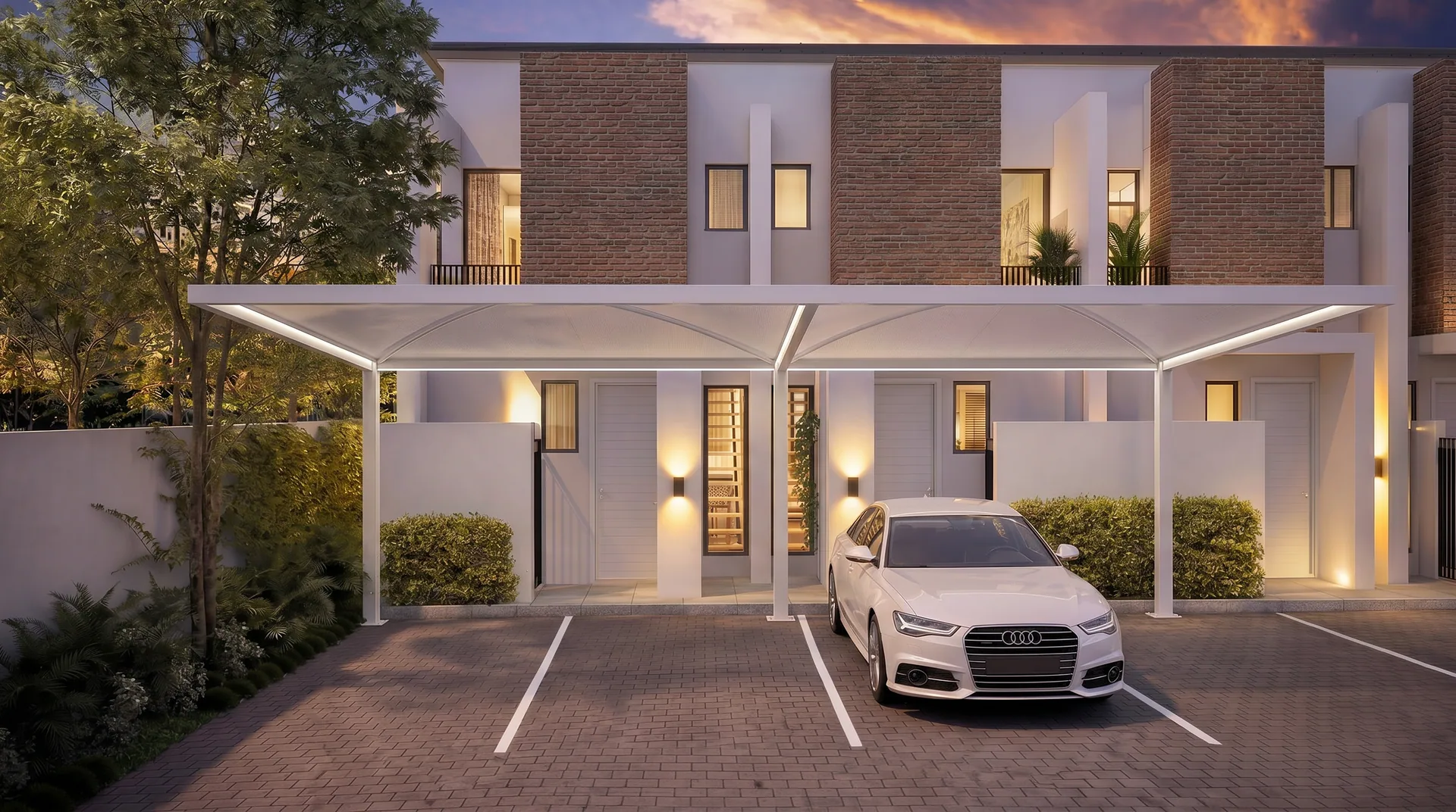 Covered parking bays in front of a duplex residence